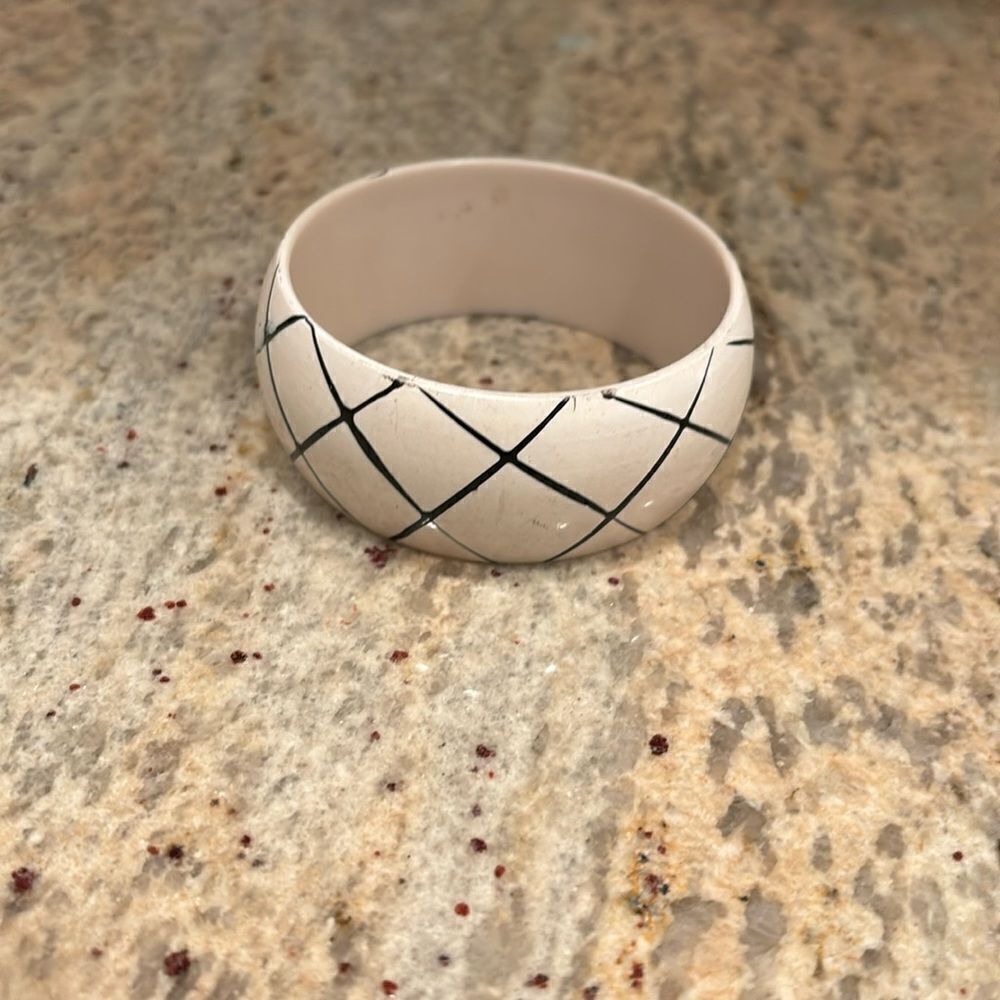 Woman's white and black bracelet